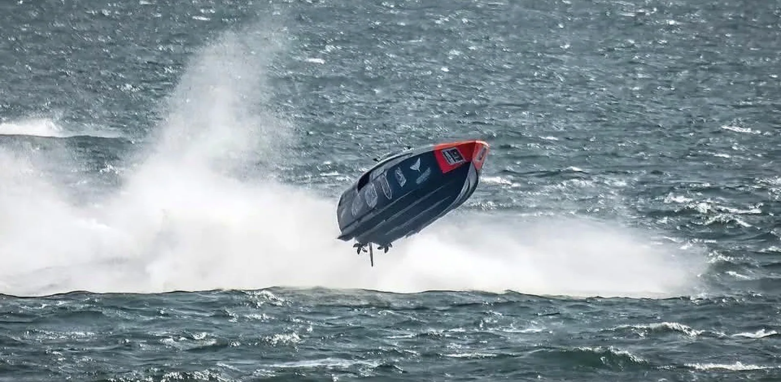 Tommy One airborne during offshore competition